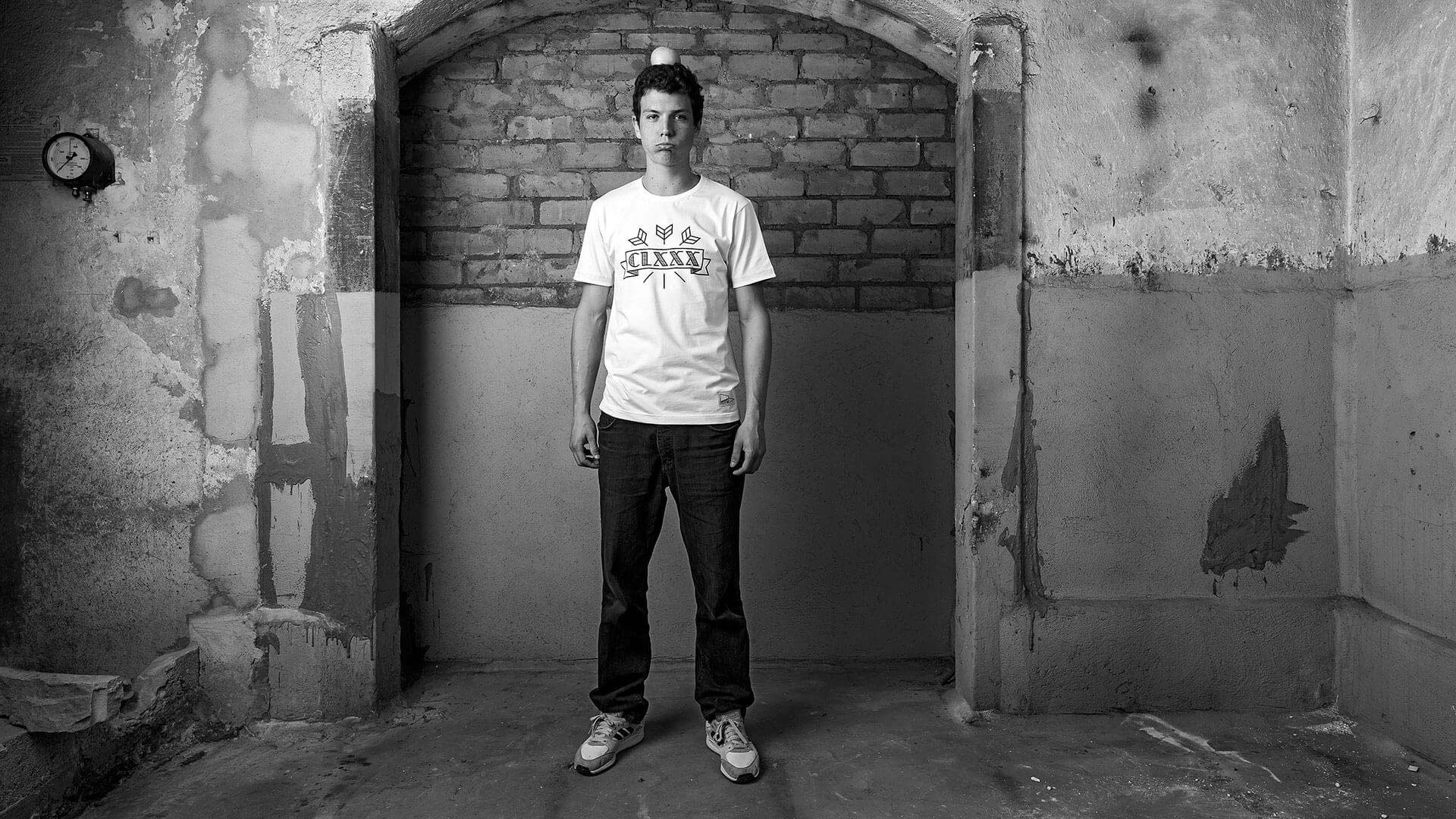 Person wearing a t-shirt with 180 in roman numerals on it.