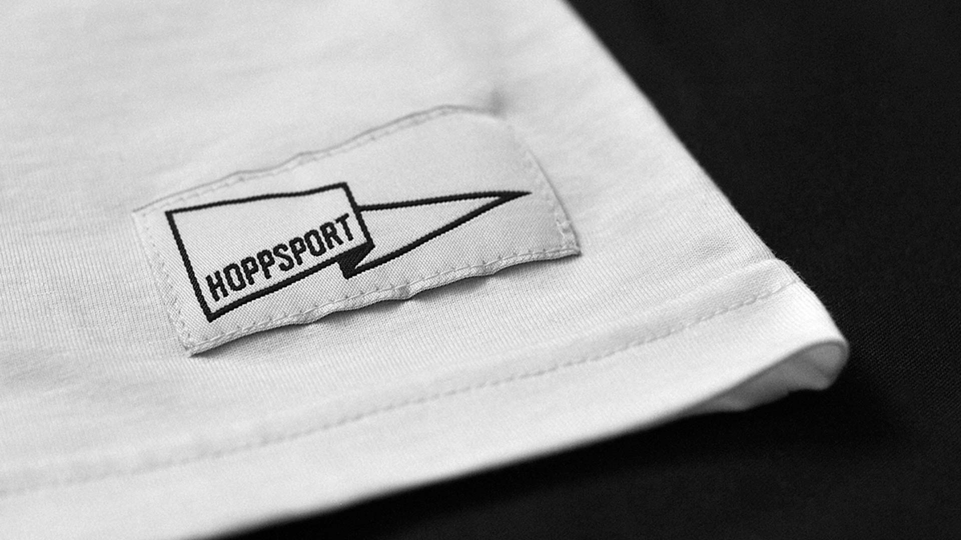 Sewn on label with Hoppsport logo